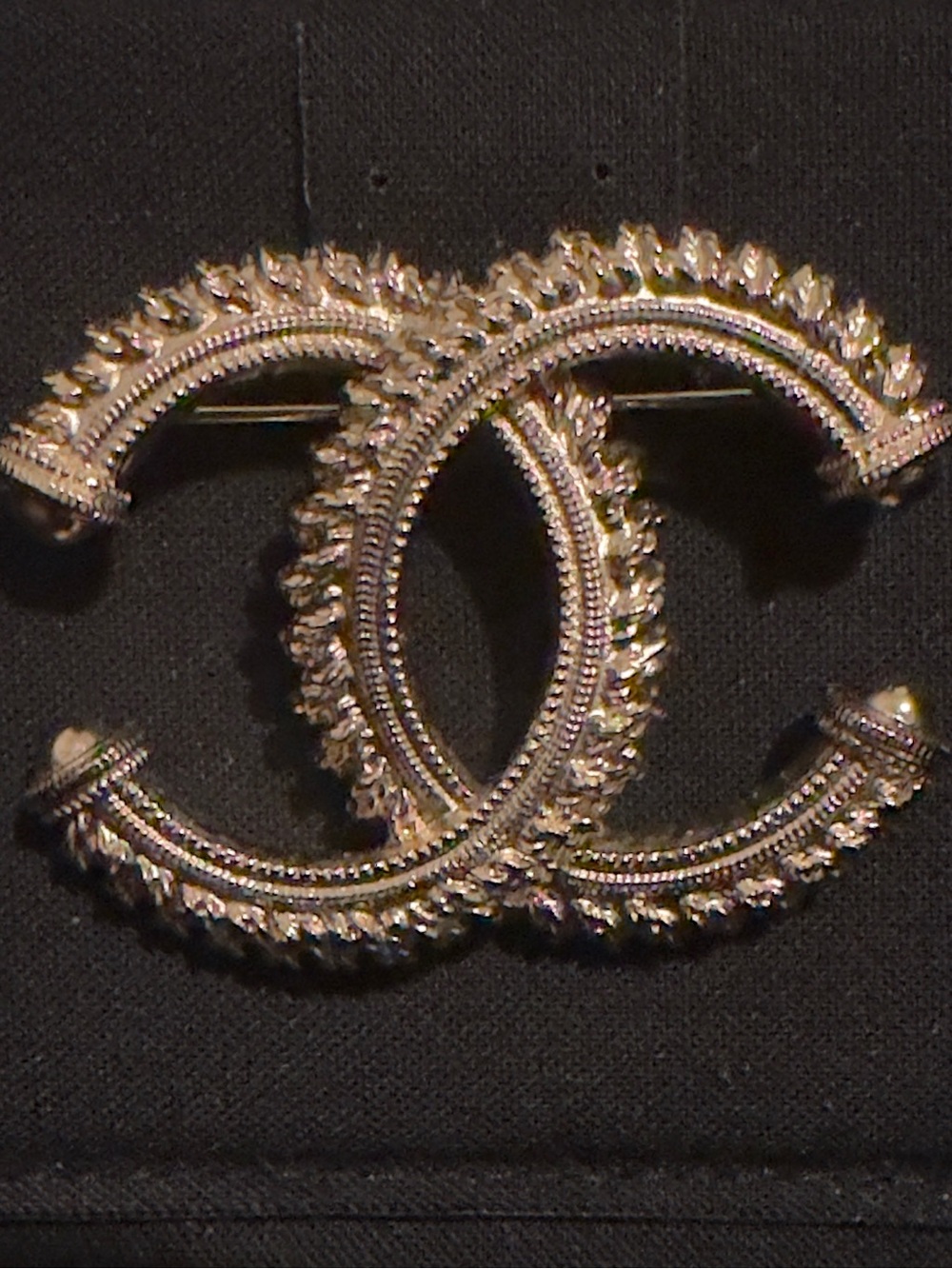 LIKE NEW Chanel Gold Double-C Logo Brooch in gold tone. Box and card included.